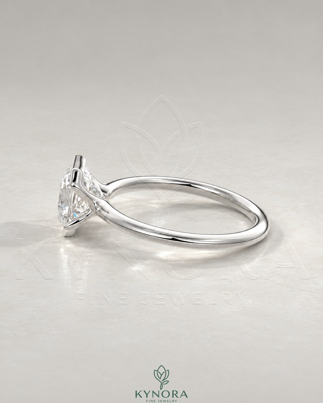 Asscher cut moissanite half-bezel solitaire ring in 925 silver with a sleek band and sparkling center stone.