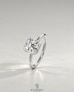 Asscher cut moissanite half-bezel solitaire ring in 925 silver, featuring a sparkling gemstone set in a sleek bezel setting.