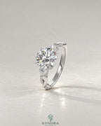 Round Moissanite 3-Stone Engagement Ring with Twisted Pavé Shank in 925 Silver