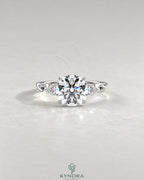 Round Moissanite 3-Stone Engagement Ring with Twisted Pavé Shank in 925 Silver