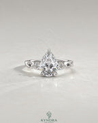 Pear Moissanite 3-Stone Engagement Ring with Twisted Pavé Shank in 925 Silver