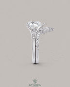 Pear Moissanite Tapered Pavé Engagement Ring in 925 Silver