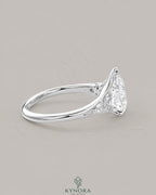 Pear Moissanite Tapered Pavé Engagement Ring in 925 Silver