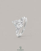 Pear Moissanite Tapered Pavé Engagement Ring in 925 Silver