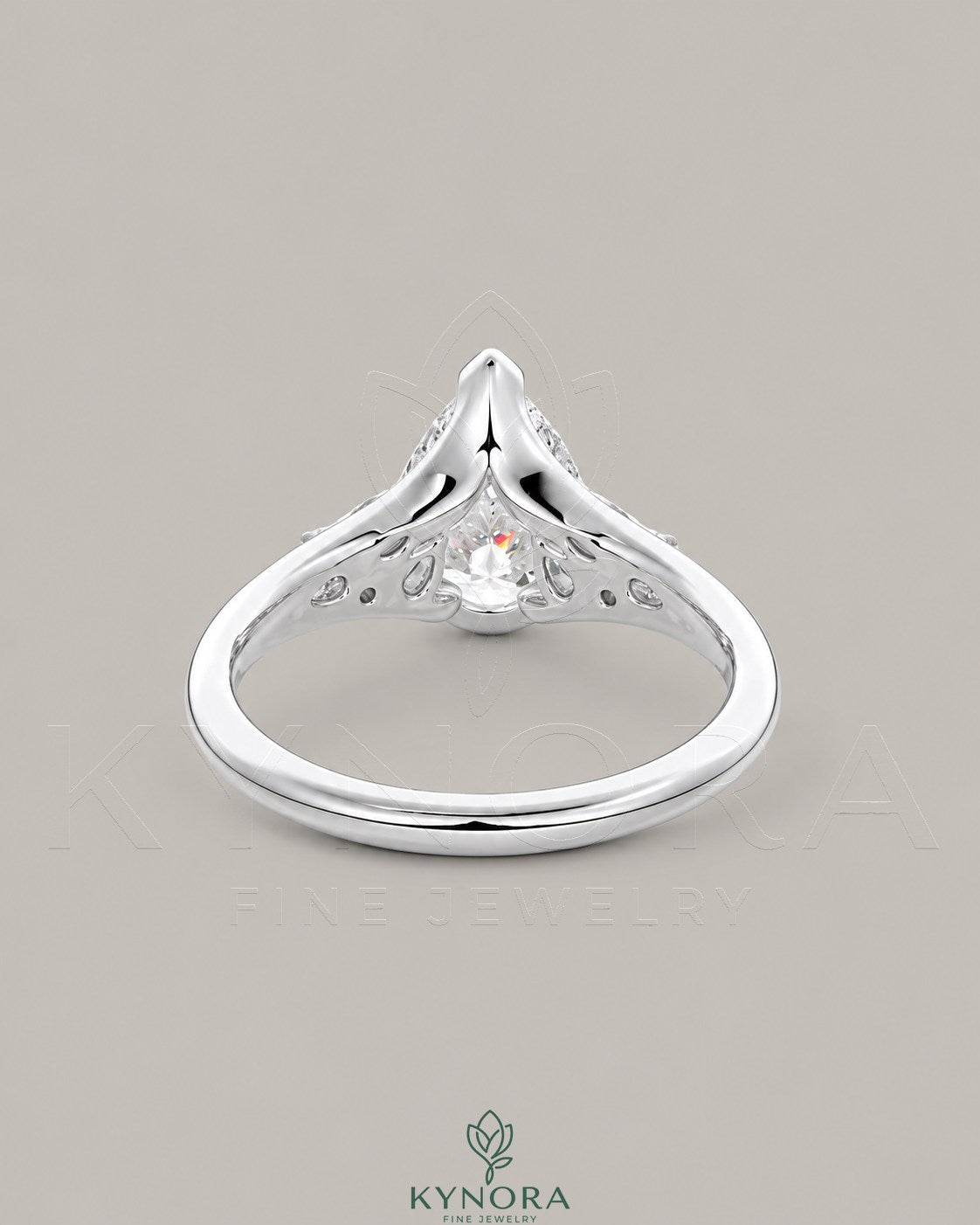 Pear Moissanite Tapered Pavé Engagement Ring in 925 Silver