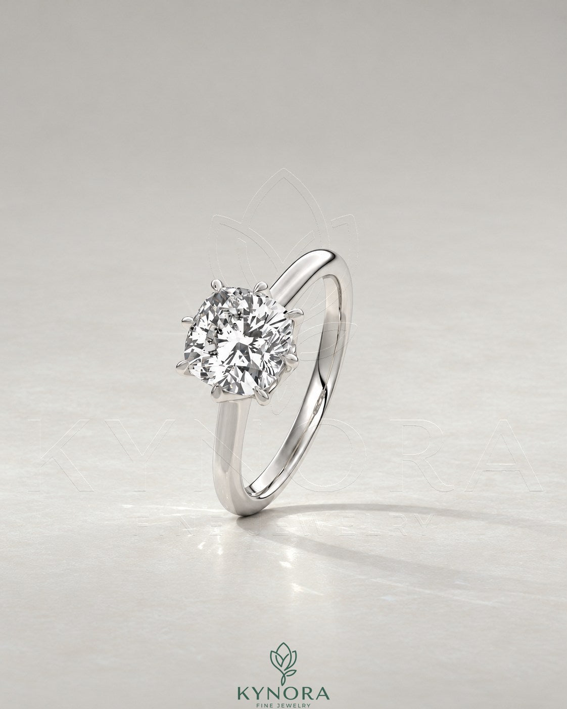 2-karätiger Solitär-Verlobungsring mit birnenförmigem Diamanten in Ost-West-Ausrichtung, Krappenfassung und geschwungener Ringschiene