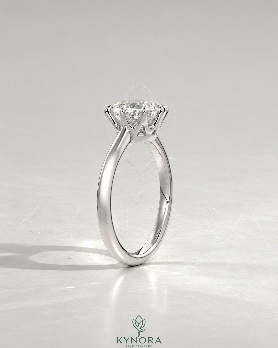 2-karätiger Solitär-Verlobungsring mit birnenförmigem Diamanten in Ost-West-Ausrichtung, Krappenfassung und geschwungener Ringschiene