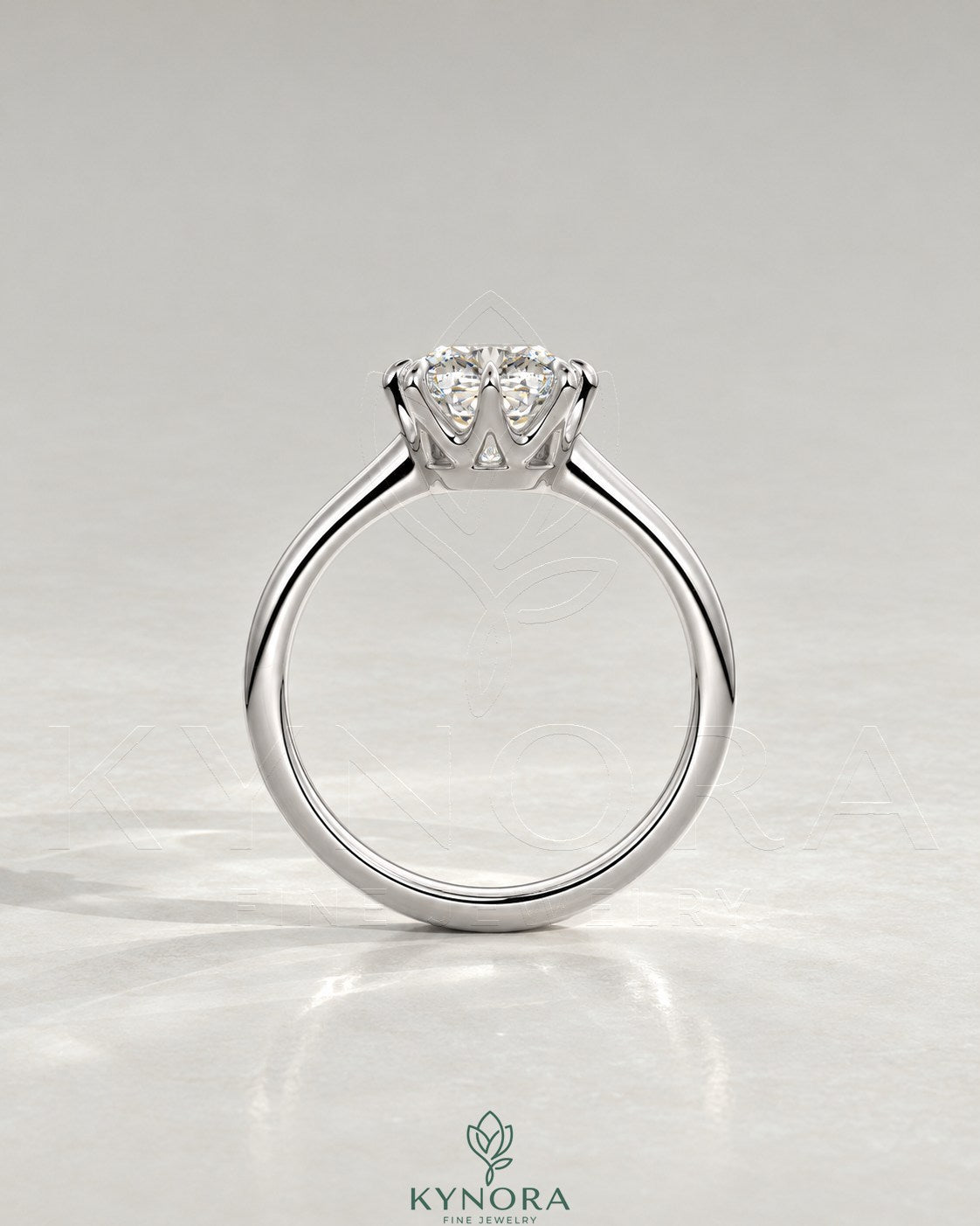 2-karätiger Solitär-Verlobungsring mit birnenförmigem Diamanten in Ost-West-Ausrichtung, Krappenfassung und geschwungener Ringschiene