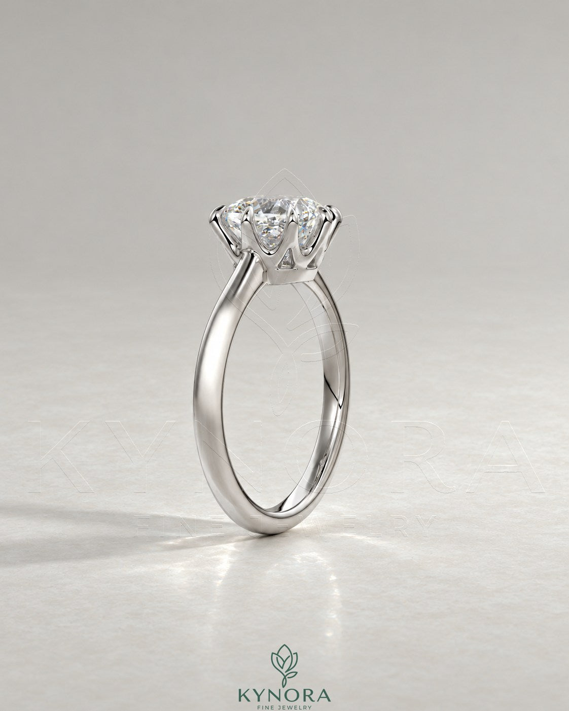 2-karätiger Solitär-Verlobungsring mit birnenförmigem Diamanten in Ost-West-Ausrichtung, Krappenfassung und geschwungener Ringschiene