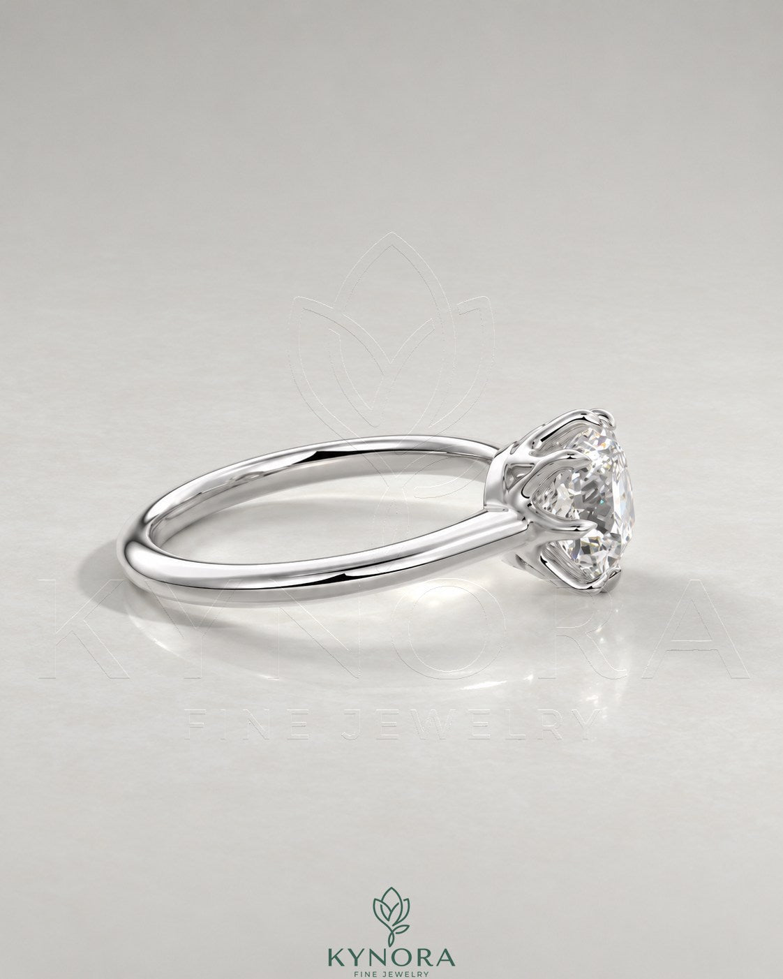 2-karätiger Solitär-Verlobungsring mit birnenförmigem Diamanten in Ost-West-Ausrichtung, Krappenfassung und geschwungener Ringschiene