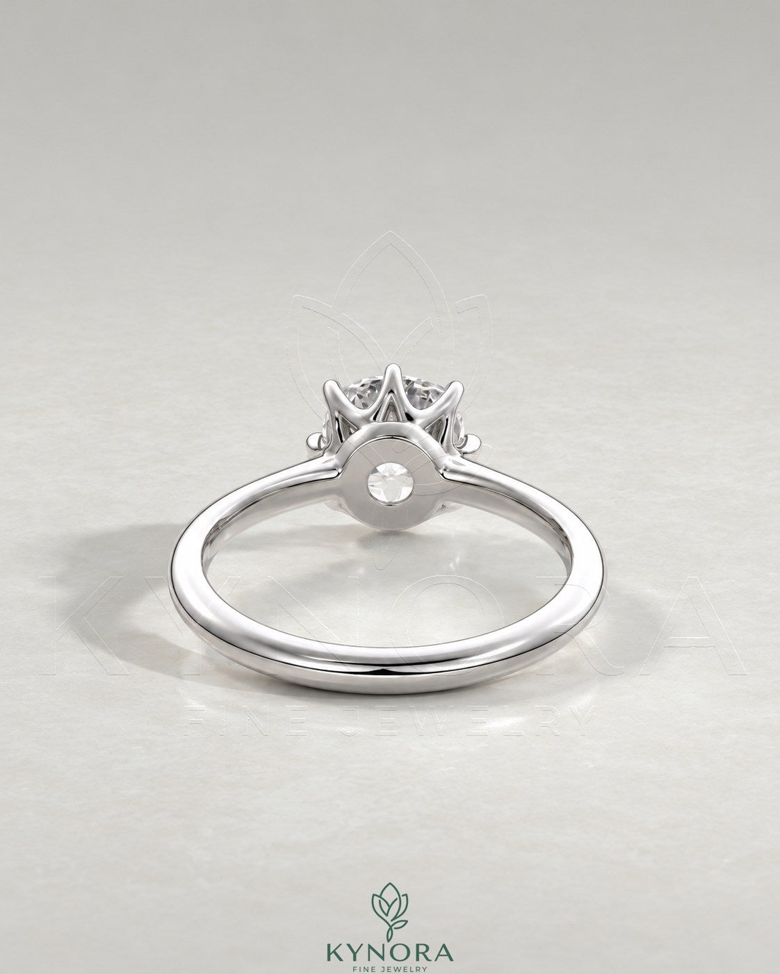 2-karätiger Solitär-Verlobungsring mit birnenförmigem Diamanten in Ost-West-Ausrichtung, Krappenfassung und geschwungener Ringschiene