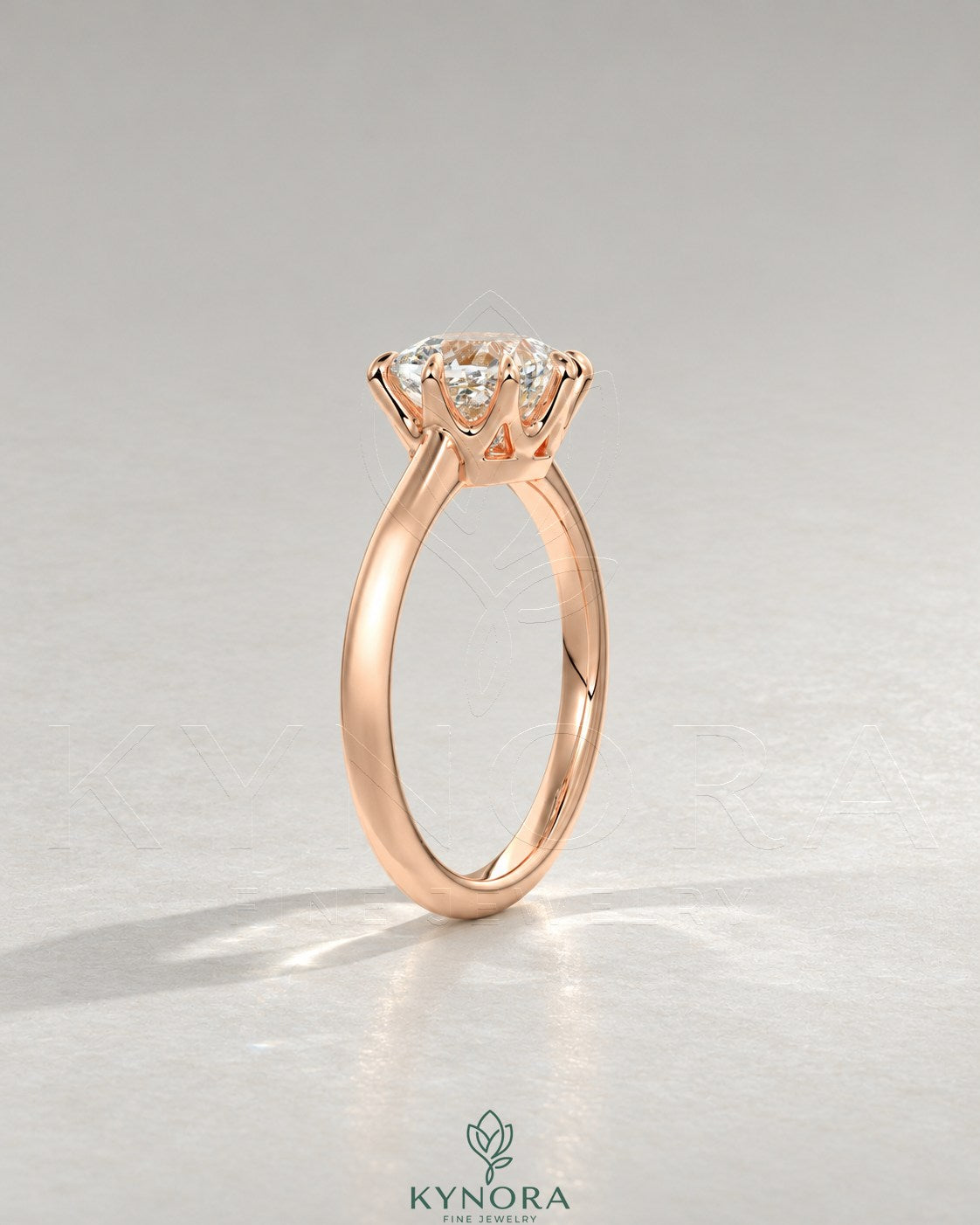 2-karätiger Solitär-Verlobungsring mit birnenförmigem Diamanten in Ost-West-Ausrichtung, Krappenfassung und geschwungener Ringschiene