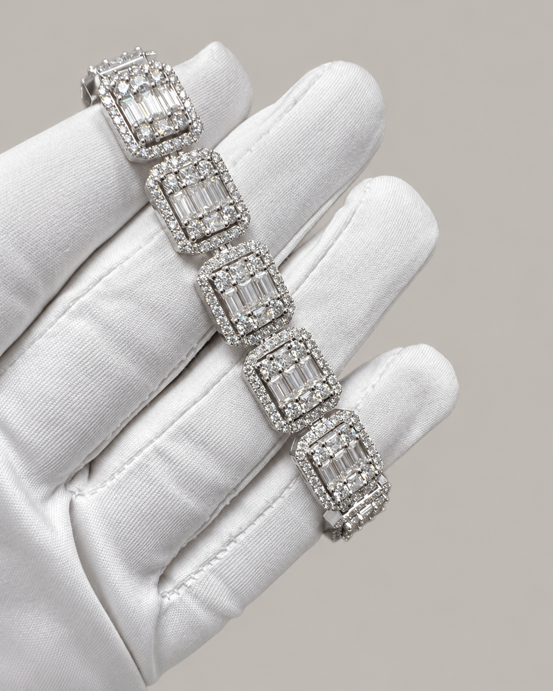 Sterling silver tennis bustdown bracelet by Kynora Jewels featuring sparkling cubic zirconia stones on a hip-hop style bracelet.