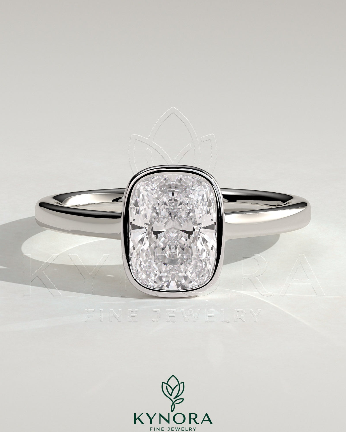 Kynora CJ 2ct elongated cushion bezel solitaire engagement ring with cathedral high setting and elegant gold band. Main image