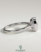 Kynora CJ 2ct elongated cushion bezel solitaire engagement ring with hidden halo and cathedral high setting, showcasing intricate design.
