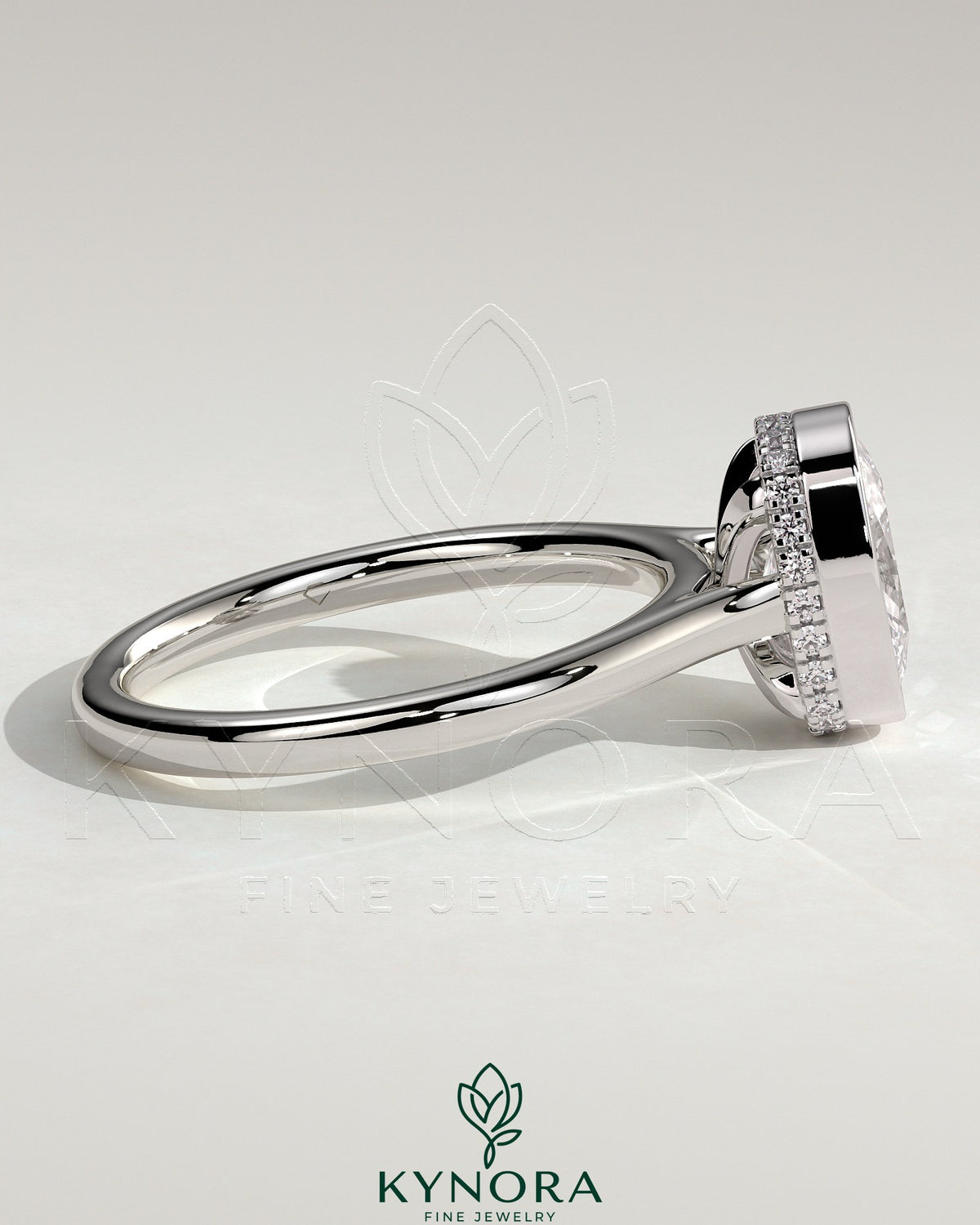 Kynora CJ 2ct elongated cushion bezel solitaire engagement ring with hidden halo and cathedral high setting, showcasing intricate design.