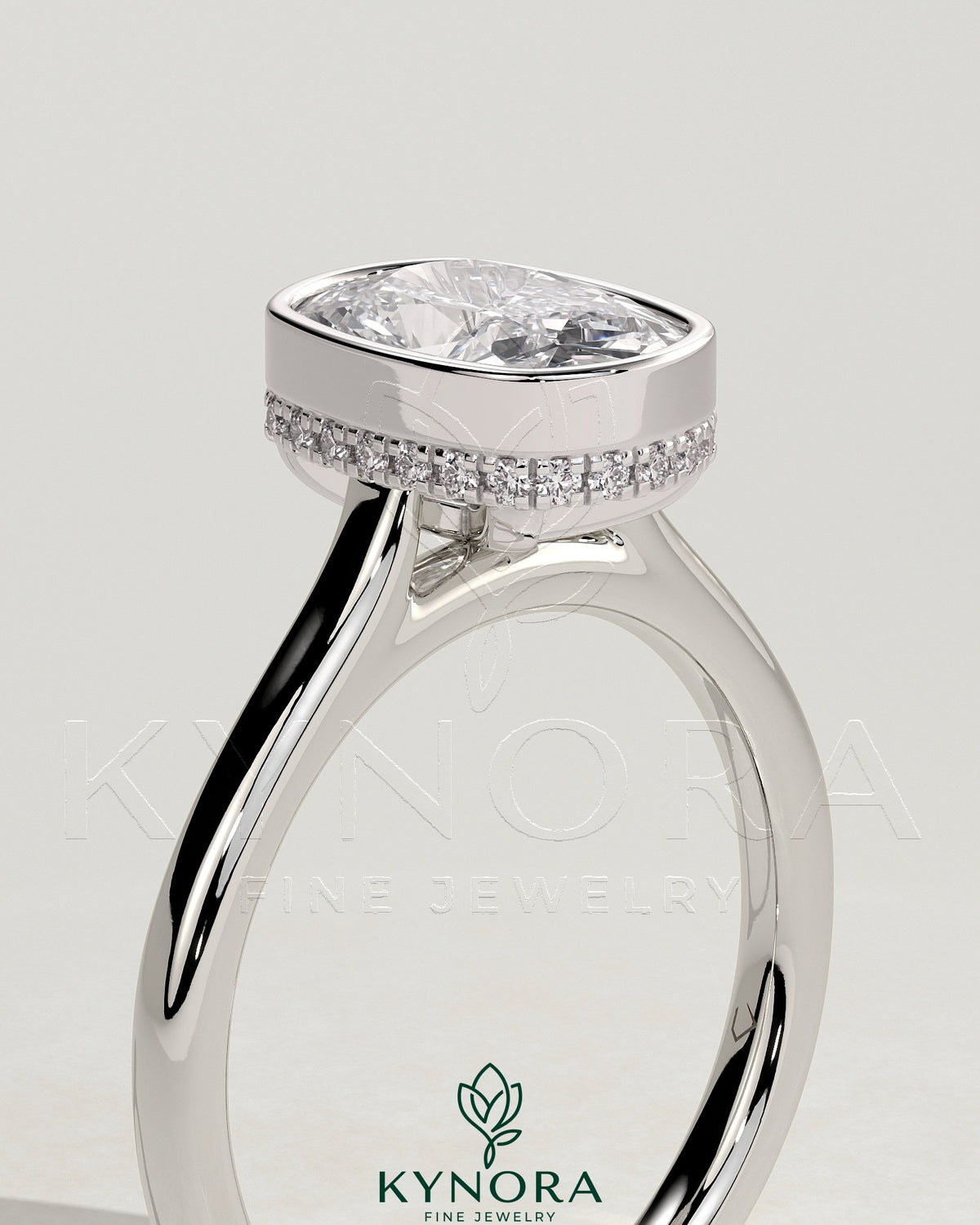 Kynora CJ 2ct elongated cushion bezel solitaire engagement ring with hidden halo and cathedral high setting, showcasing intricate design.