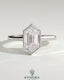 Kynora CJ 2ct elongated hexagon bezel solitaire engagement ring with hidden halo and cathedral high setting, showcasing intricate design.