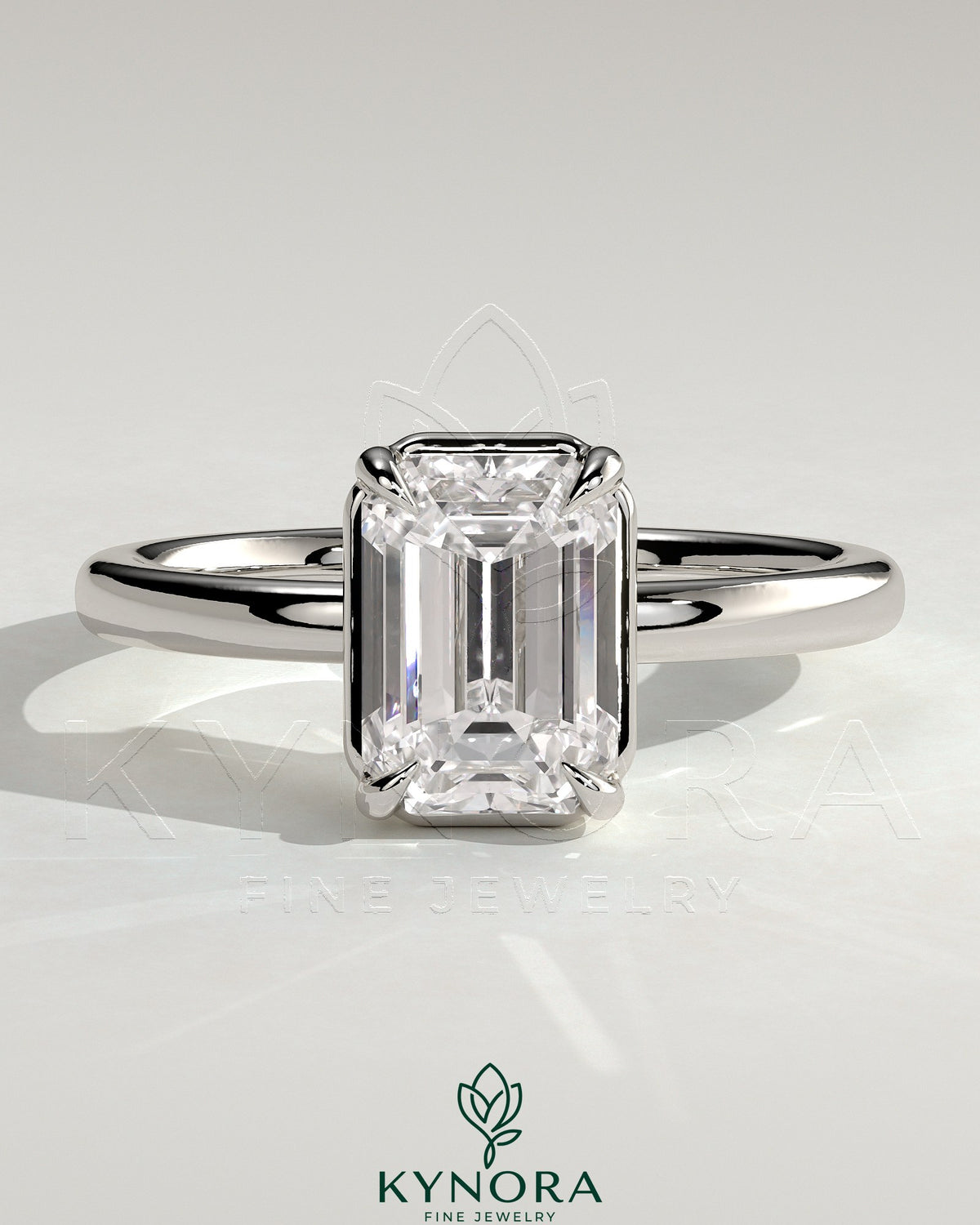 Bezel engagement ring with 2ct emerald claw solitaire diamond set in a sleek bezel frame by Kynora CJ. Main image