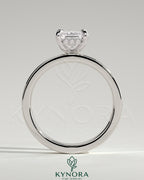 Kynora CJ 2ct emerald claw solitaire engagement ring with flat cigar band and hidden halo in bezel setting