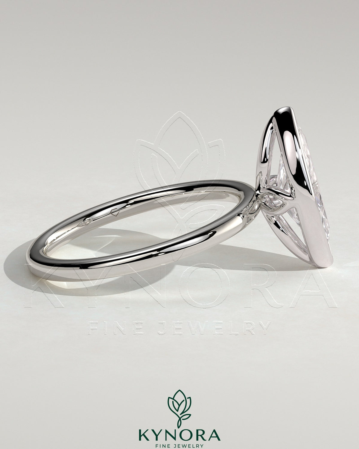 Kynora CJ 2ct marquise bezel solitaire engagement ring with petal gallery design, featuring a sparkling marquise-cut diamond.