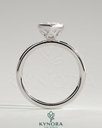 Kynora CJ 2ct marquise bezel solitaire engagement ring with petal gallery design featuring a diamond in a sleek bezel setting.