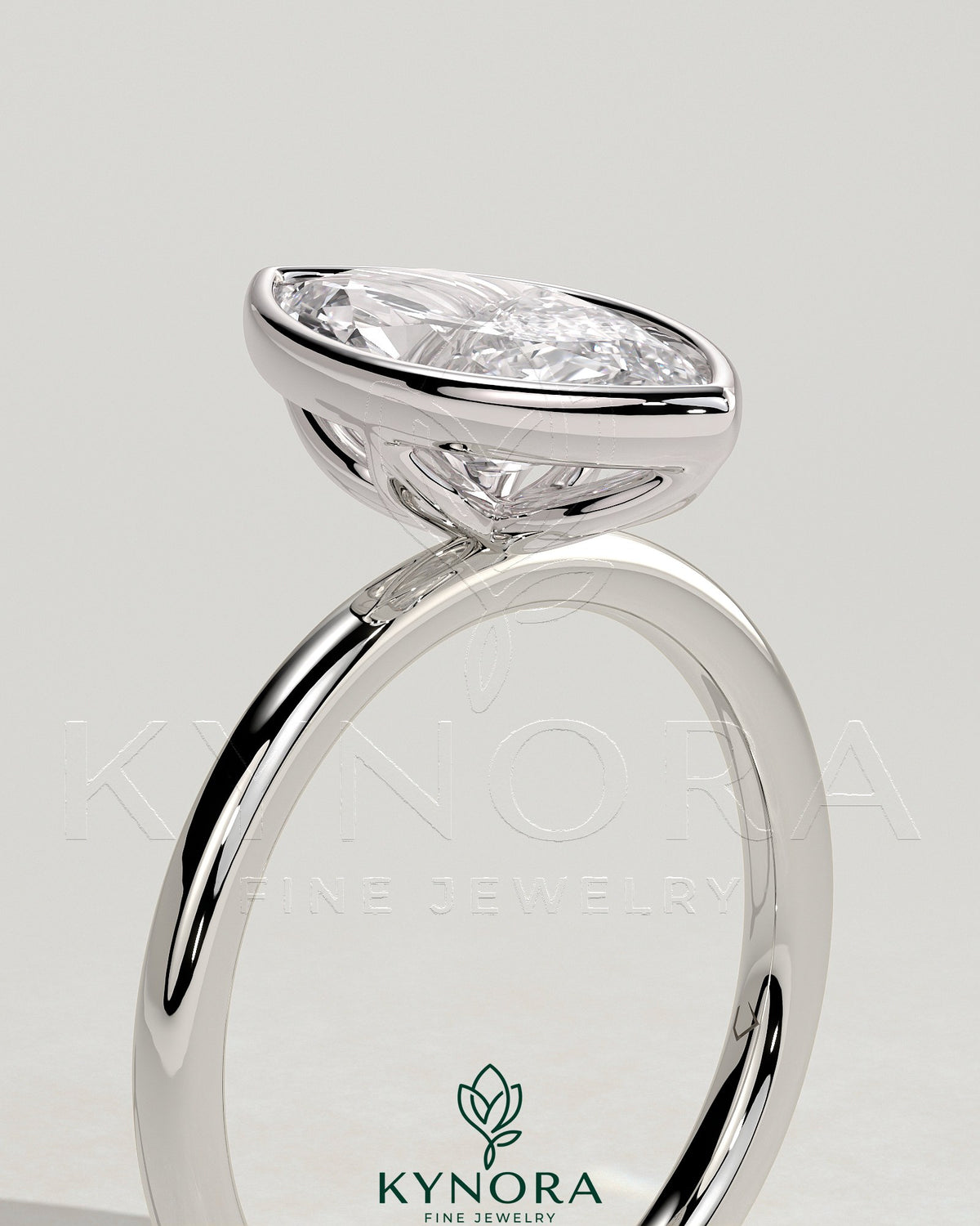 Kynora CJ 2ct marquise bezel solitaire engagement ring with petal gallery design in gold, showcasing the detailed setting and sparkling stone.