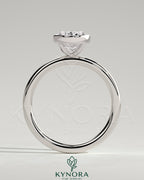 Kynora CJ 2ct oval bezel solitaire engagement ring featuring a central oval diamond set in a sleek bezel setting.