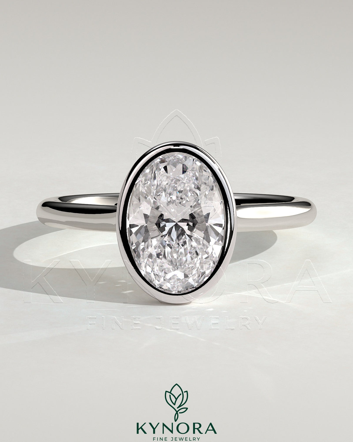 Kynora CJ 2ct oval bezel solitaire engagement ring with cathedral high setting, showcasing a sparkling oval diamond and elegant band. Main image