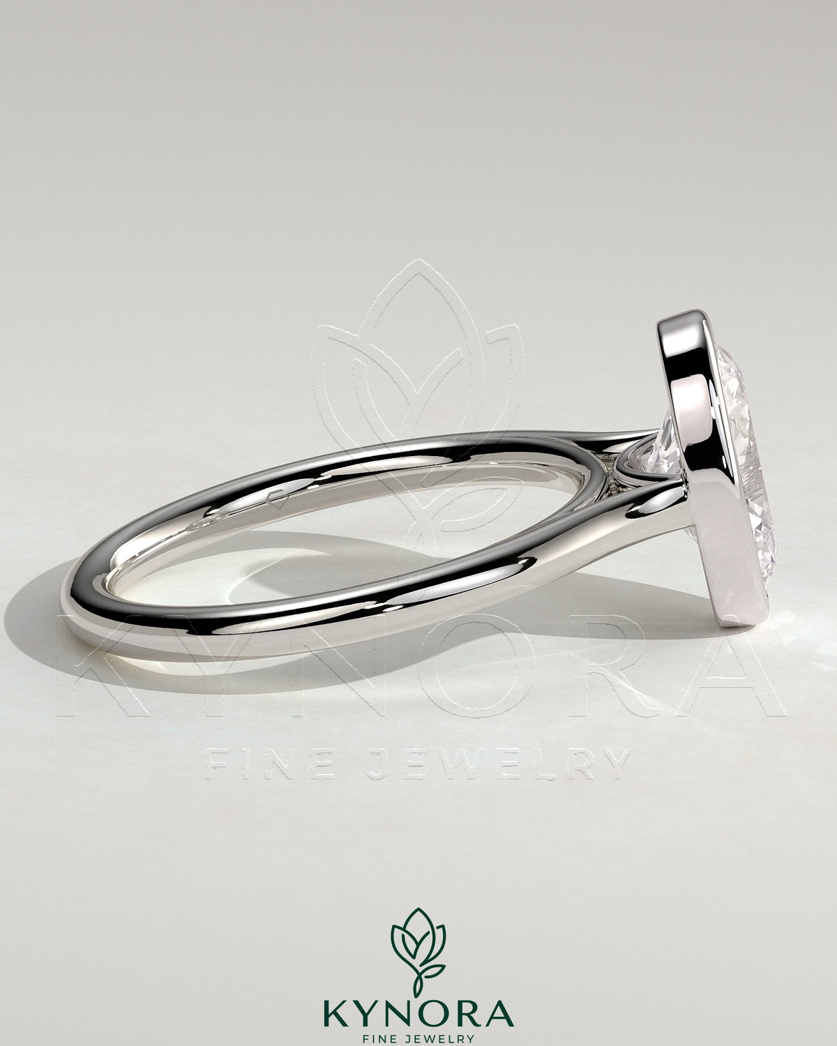Kynora CJ 2ct oval bezel solitaire engagement ring with cathedral high setting, showcasing a sparkling oval diamond and elegant band.