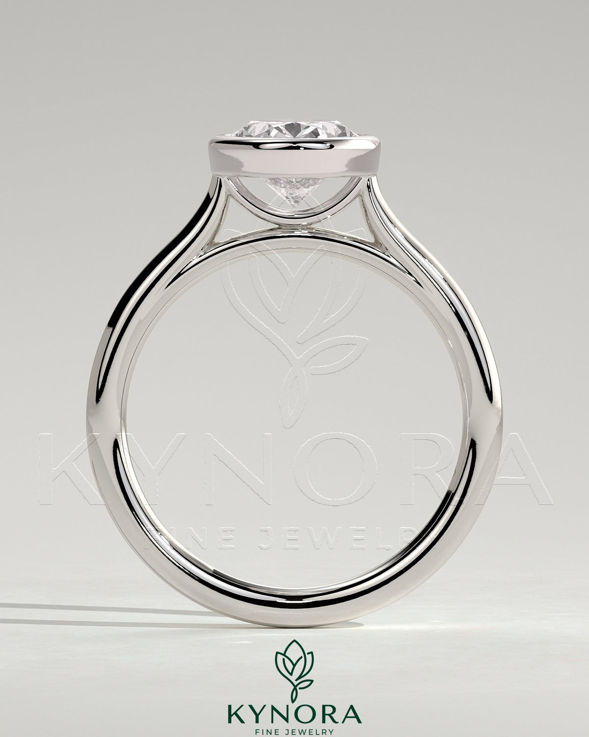 Kynora CJ 2ct oval bezel solitaire engagement ring with cathedral high setting, showcasing a sparkling oval diamond and elegant band.