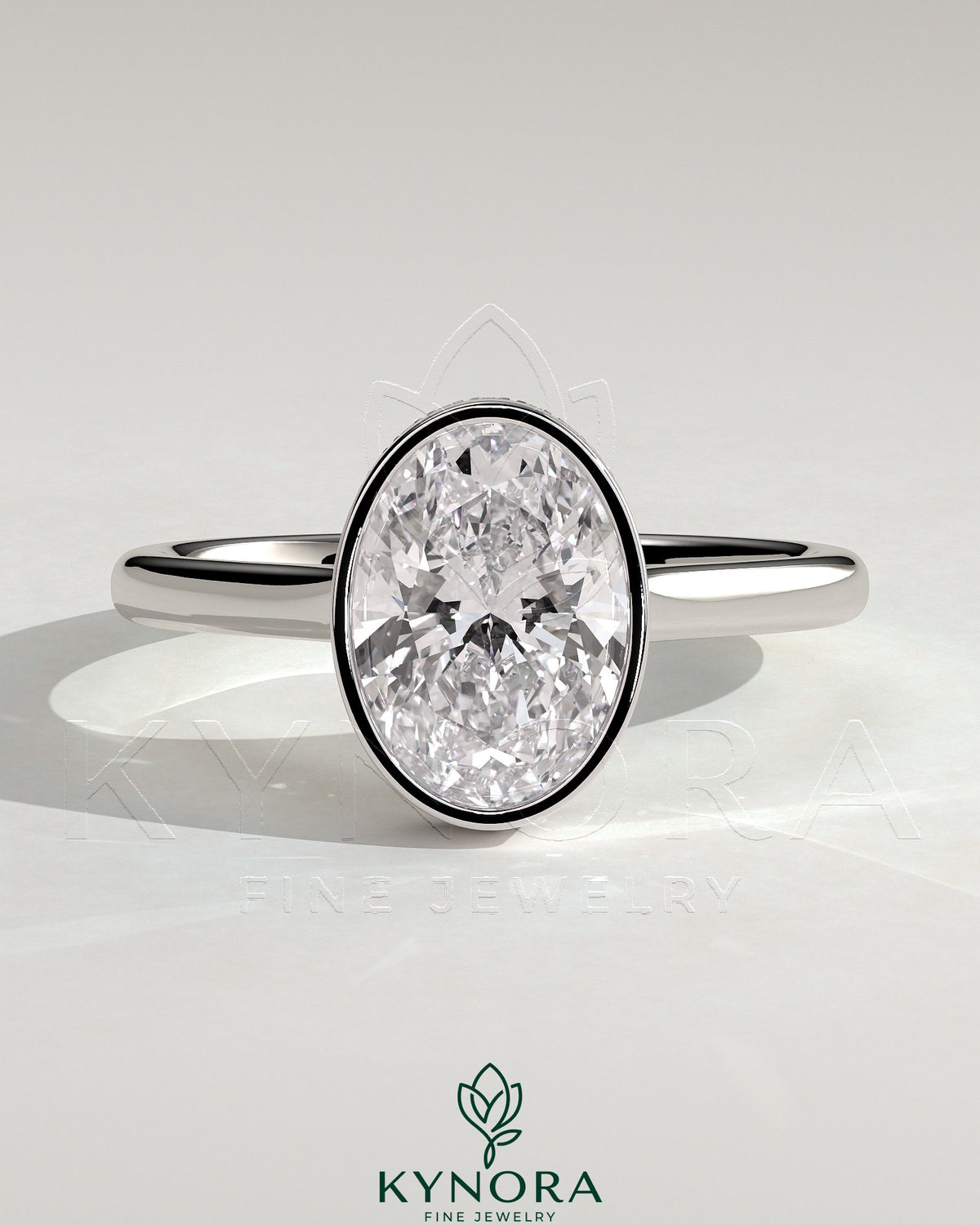 Kynora CJ 2ct oval bezel solitaire engagement ring with hidden halo and cathedral high setting, showcasing sparkling diamond and detailed design.