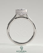 Kynora CJ 2ct oval bezel solitaire engagement ring with hidden halo and cathedral high setting, showcasing intricate metalwork.