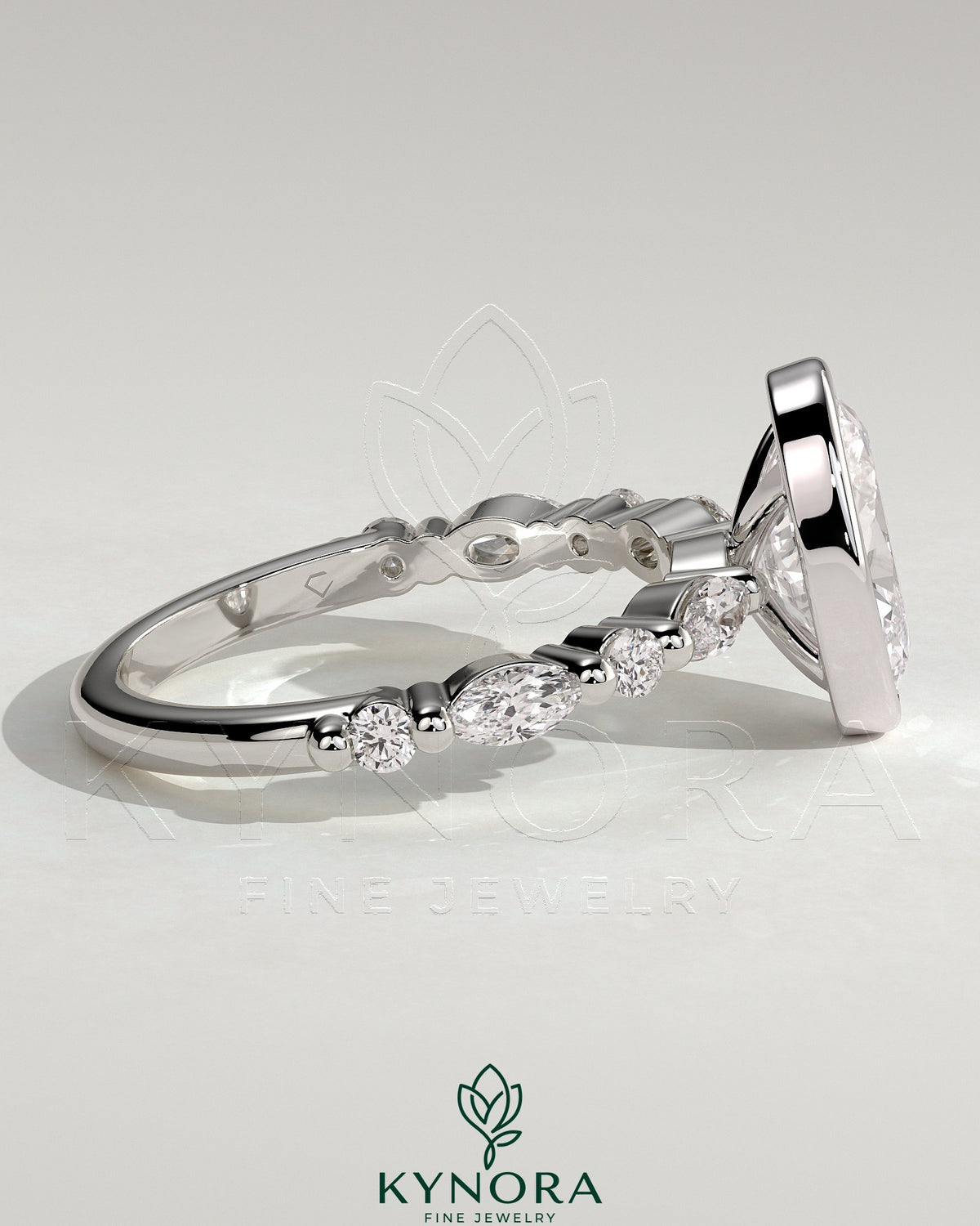 Kynora CJ 2ct oval bezel solitaire engagement ring with marquise and round accent stones, elegant jewelry design.