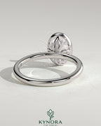Kynora CJ 2ct oval bezel solitaire engagement ring with petal gallery design in elegant gold setting