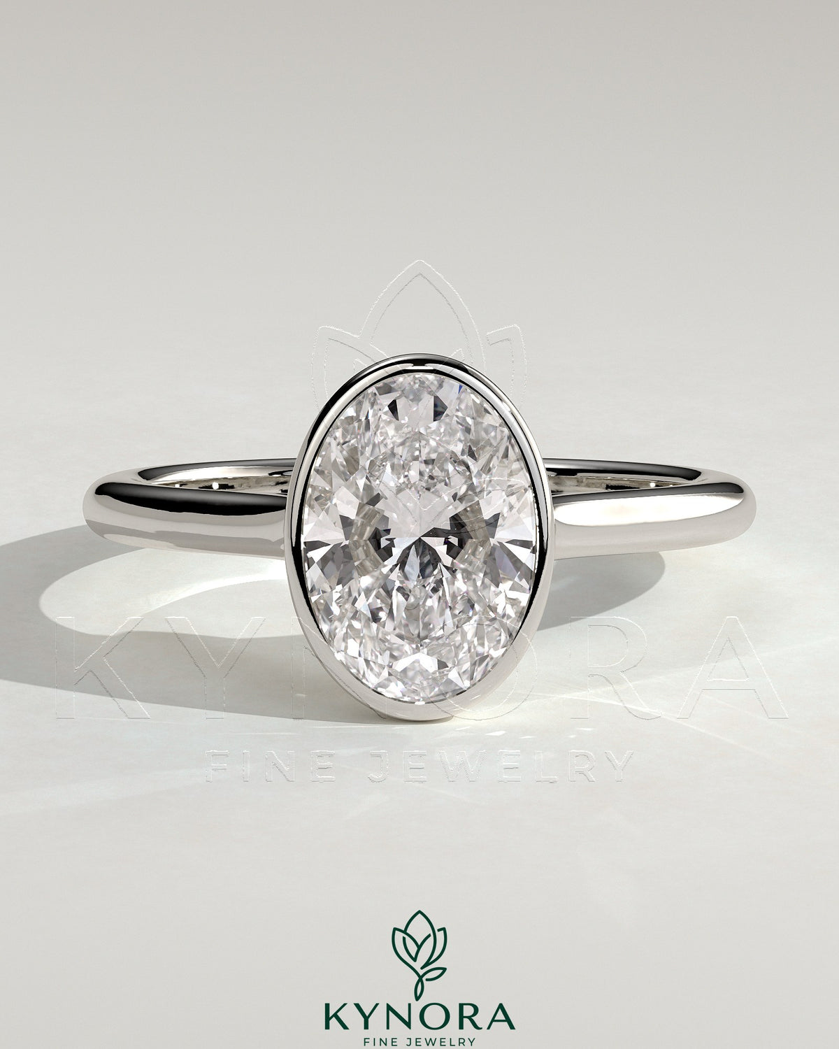 Kynora CJ 2ct oval bezel solitaire engagement ring with twisted gallery design, featuring a sparkling central stone and intricate band details.