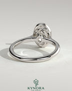 Kynora CJ 2ct oval bezel solitaire engagement ring with twisted gallery design in sterling silver.