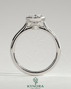 Kynora CJ 2ct oval bezel solitaire engagement ring with twisted gallery design in a close-up view.