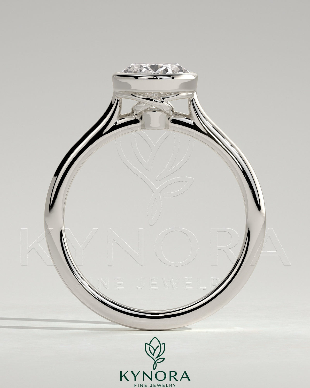 Kynora CJ 2ct oval bezel solitaire engagement ring with twisted gallery design in a close-up view.