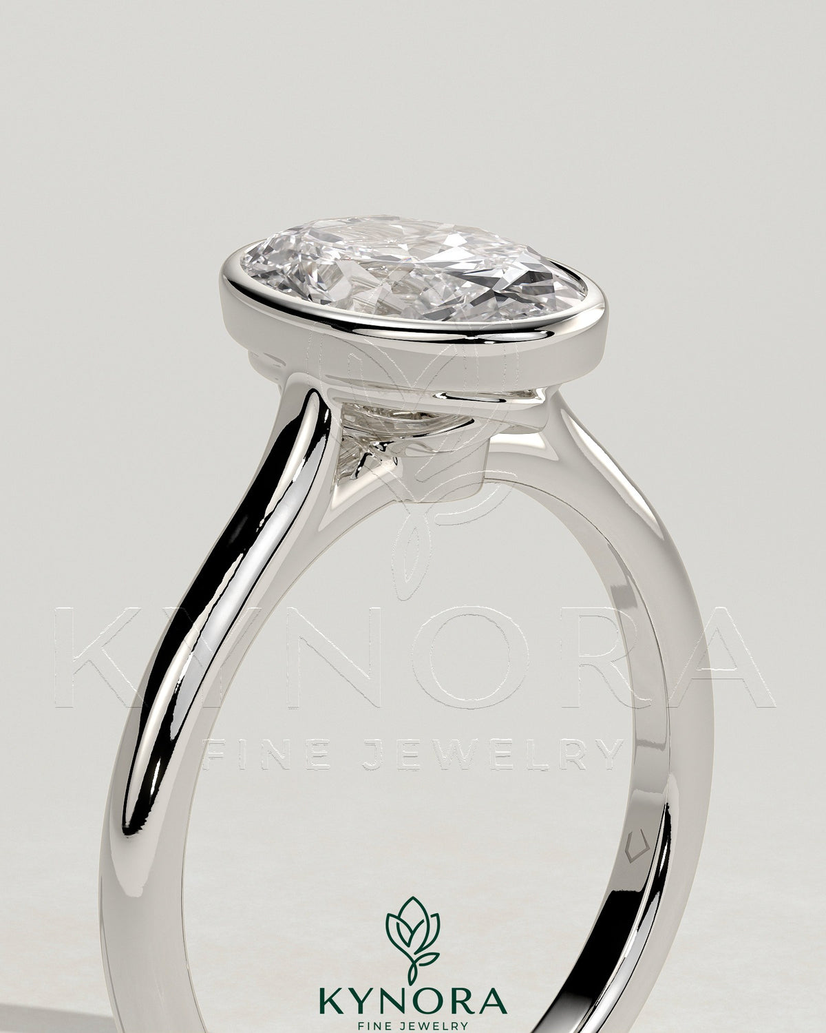 Kynora CJ 2ct oval bezel solitaire engagement ring with twisted gallery setting, showcasing a sparkling diamond and intricate band details.