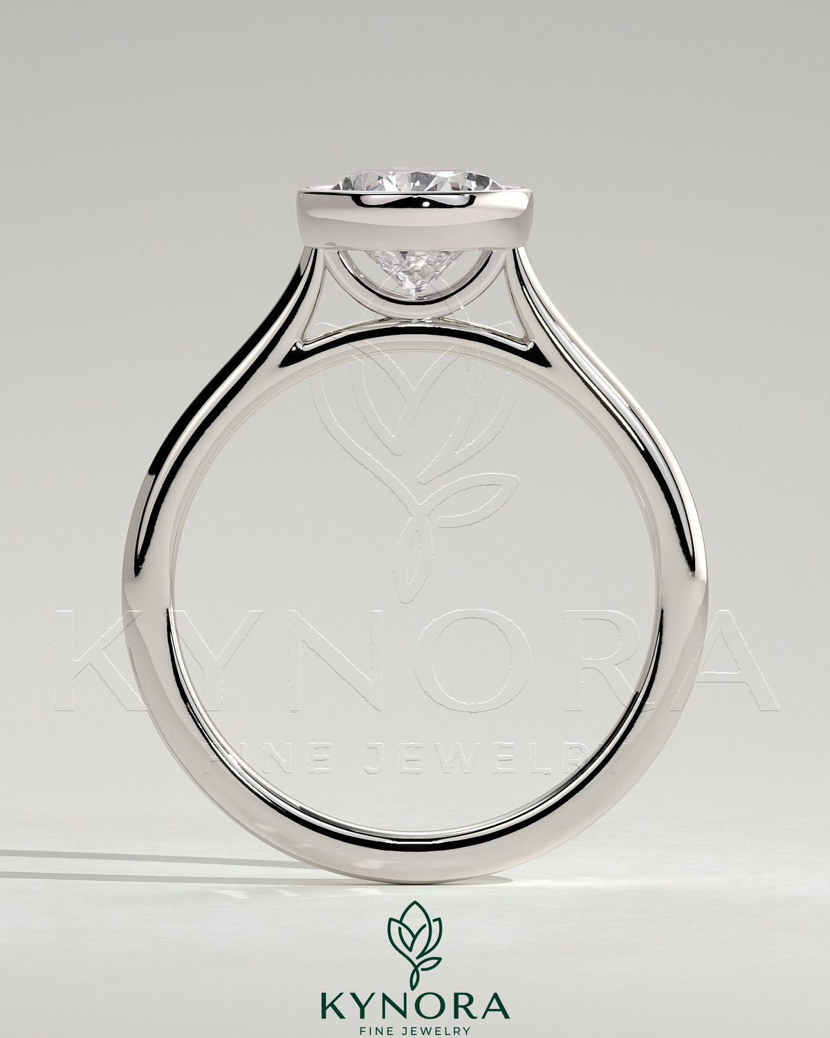 Kynora CJ 2ct pear-shaped diamond bezel solitaire engagement ring with cathedral high setting, showcasing elegant craftsmanship.