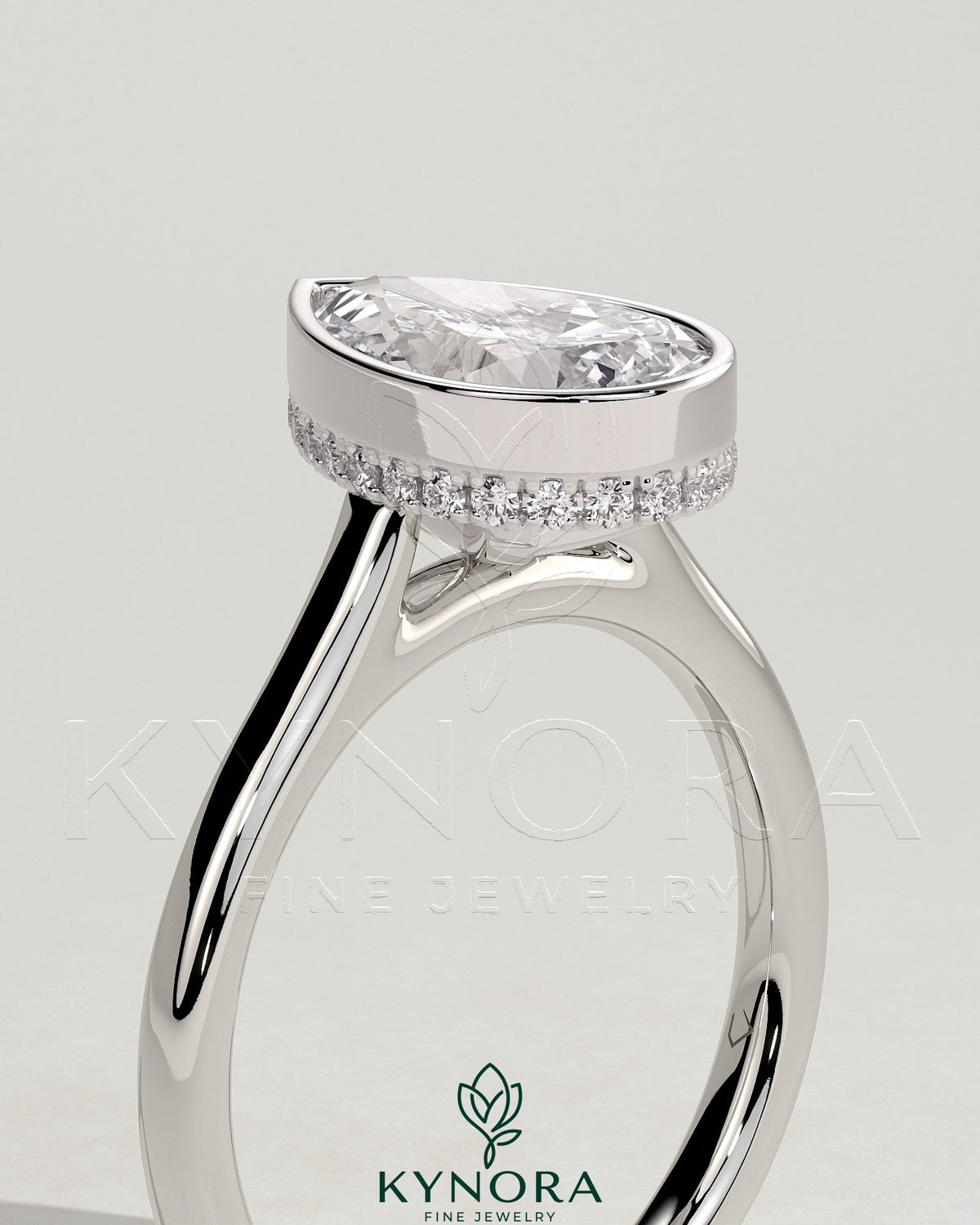 Kynora CJ 2ct pear-shaped diamond bezel solitaire engagement ring with hidden halo and cathedral high setting in sterling silver