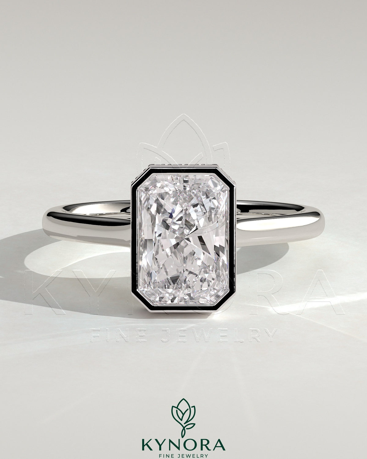 Kynora CJ 2ct radiant bezel solitaire engagement ring with hidden halo and cathedral high setting, showcasing intricate design details. Main image