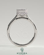Kynora CJ 2ct radiant bezel solitaire engagement ring with hidden halo and cathedral high setting, featuring a sparkling central diamond.