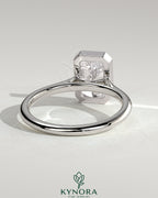 Kynora CJ 2ct radiant bezel solitaire engagement ring with open cathedral high setting, showcasing a sparkling center diamond.