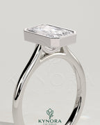 Kynora CJ 2ct radiant bezel solitaire engagement ring with open cathedral high setting and elegant design.
