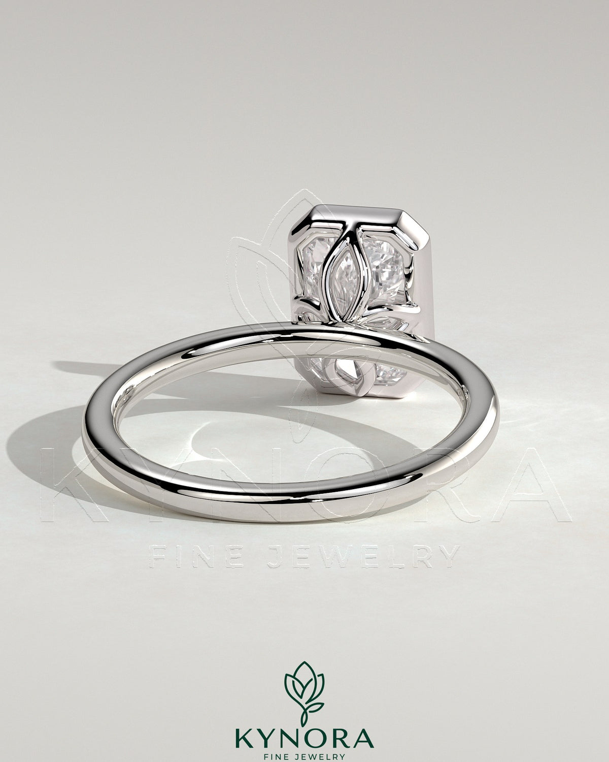 Kynora CJ 2ct radiant bezel solitaire engagement ring with petal gallery design, showcasing a central gemstone and intricate band details.