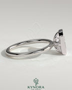 Kynora CJ 2ct radiant bezel solitaire engagement ring with petal gallery design, featuring a central radiant-cut diamond in a sleek bezel setting.