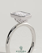 Kynora CJ 2ct Radiant Bezel Solitaire Engagement Ring with Petal Gallery design, featuring a radiant-cut center stone and intricate band.