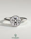 Kynora CJ 2ct round bezel solitaire engagement ring with petal gallery design, showcasing a sparkling diamond on a silver band.
